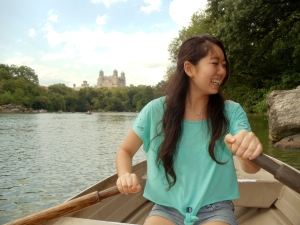 My sister rowing our boat on the lake at Central Park