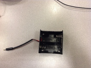 This battery housing held two D-cell batteries, arranging them in series.
